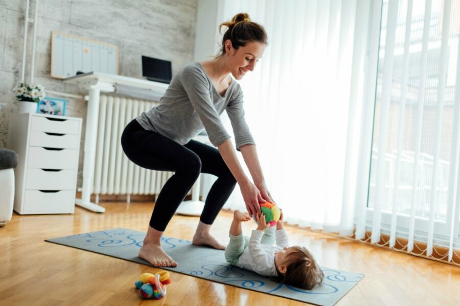 mum doing squat exercises