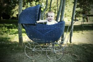 Baby-Girl-in-Antique-Carriage