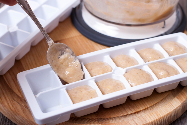 Banana puree in a spoon