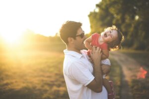 Father and daughter in nature