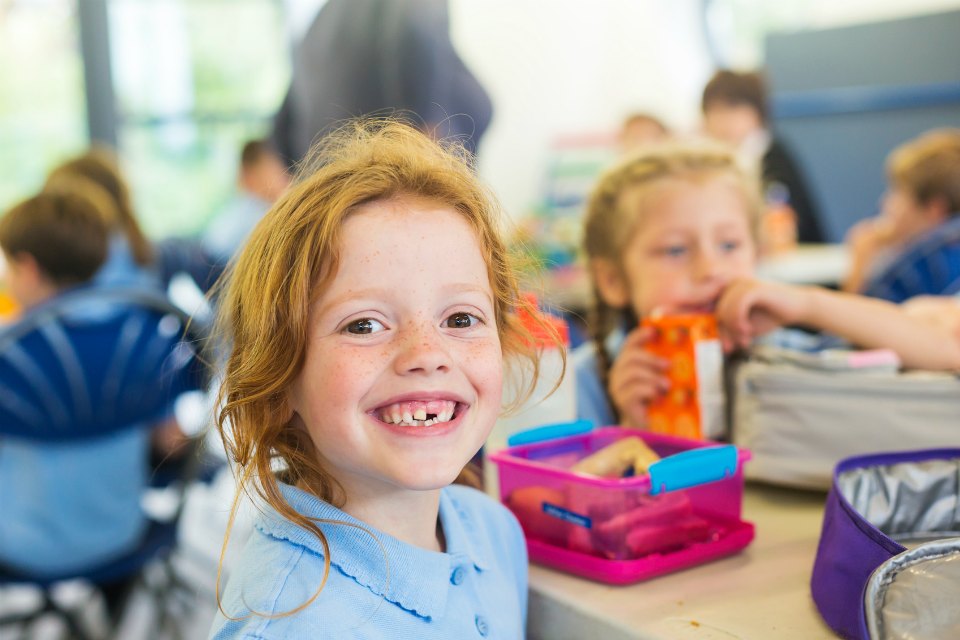 smiling girl first day of school