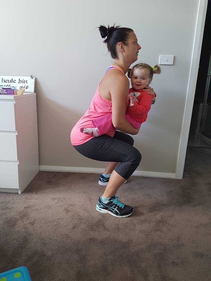 Julie-Meadows-squats-with-daughter