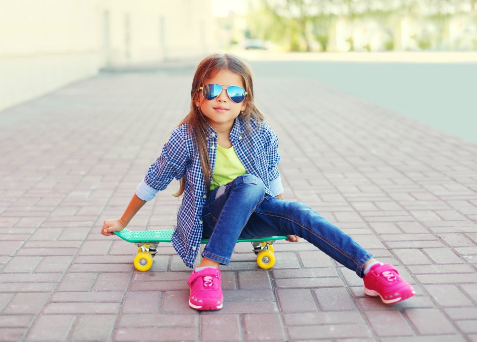 trendy girl on skateboard