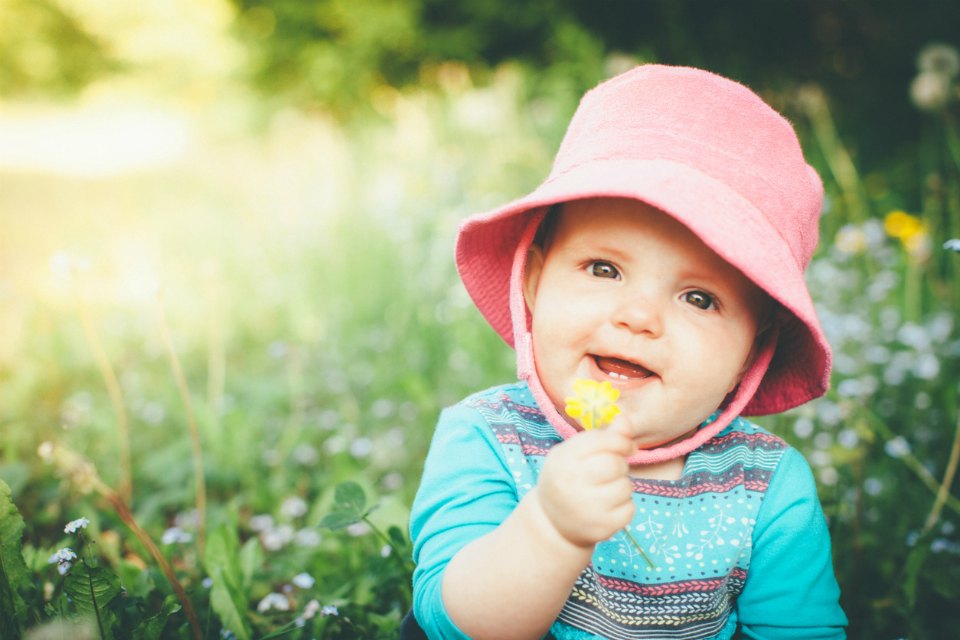 baby with flower