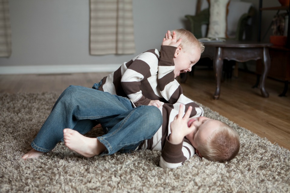 Play fighting is scary to watch but it's not going anyway, no matter how often you tell them to stop.