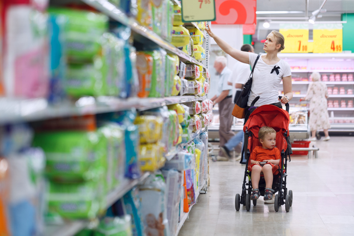 Mother with her boy in the supermarket