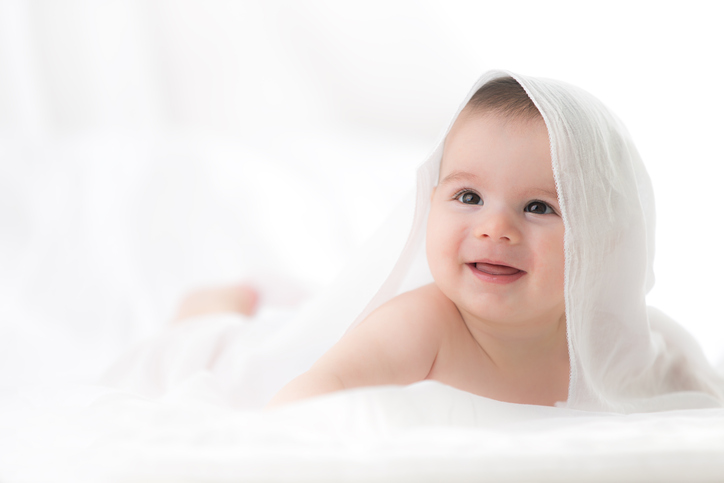 Cute baby boy on white background.