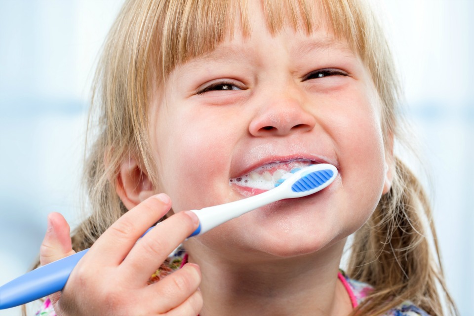 7 Tricks To Get Kids To WANT To Brush Their Teeth 1