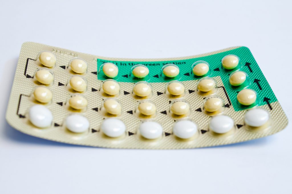 One round of the pill against a white background