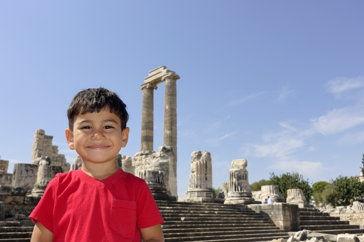 Portrait of smiling boy in the temple of Apollo. Didyma - TURKEY