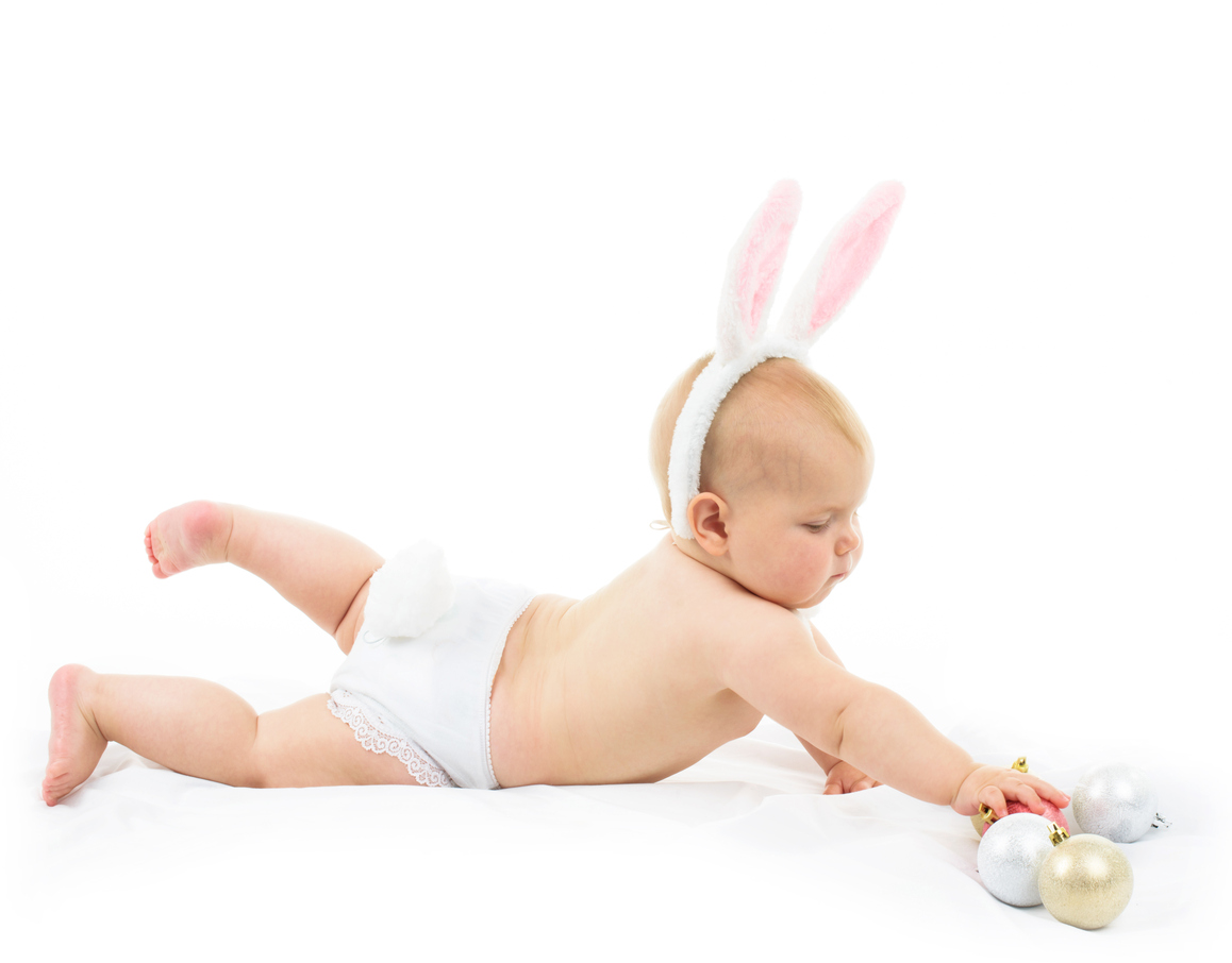 Baby with Bunny Ears and Christmas decorations