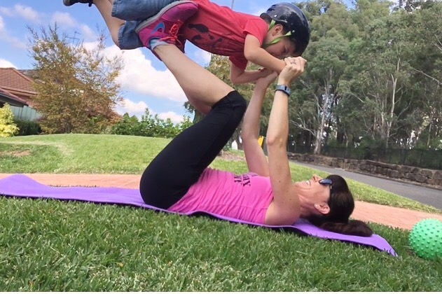 Mum exercising with her son