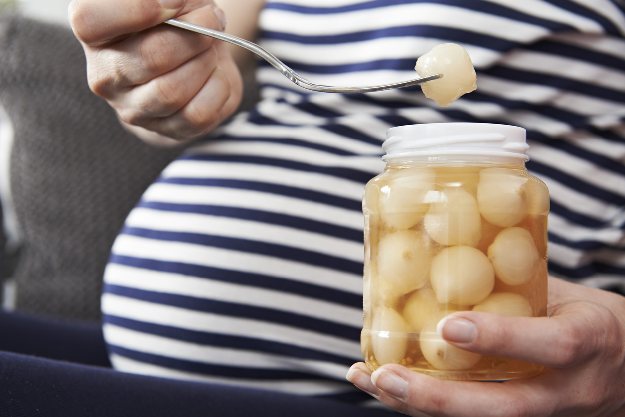 Pregnant Woman With Craving For Pickled Onions