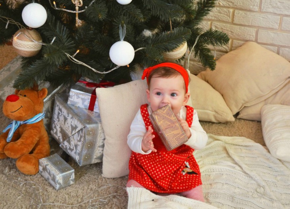 baby with Christmas present