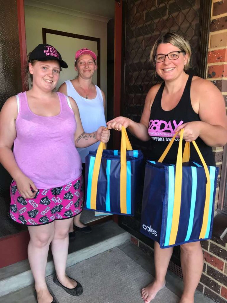 Nikola Green donating the meals to mums in her community