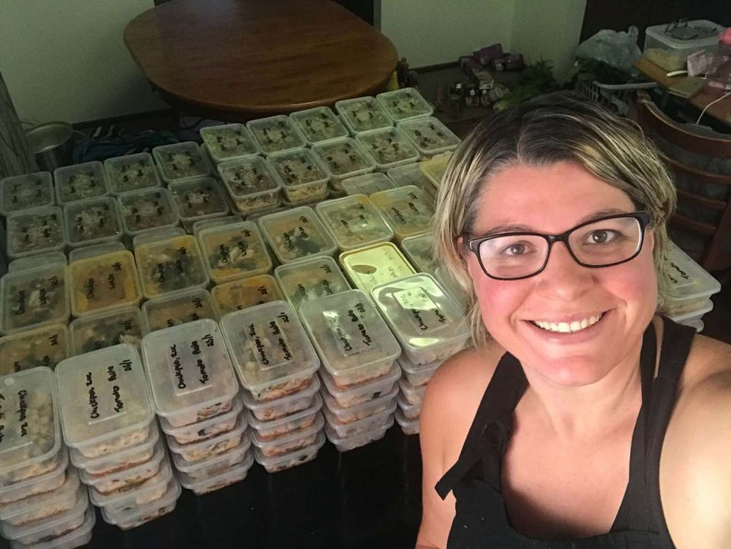 Nikola in front of her meal prep 