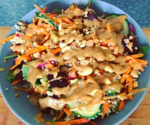 Rainbow quinoa salad with Thai satay dressing