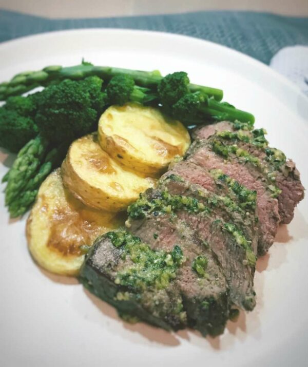 Pesto Crusted Lamb with Potatoes & Greens