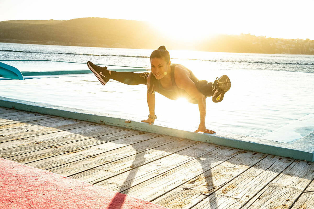 wendy holding a pose on the wharfs edge at sunset resilience