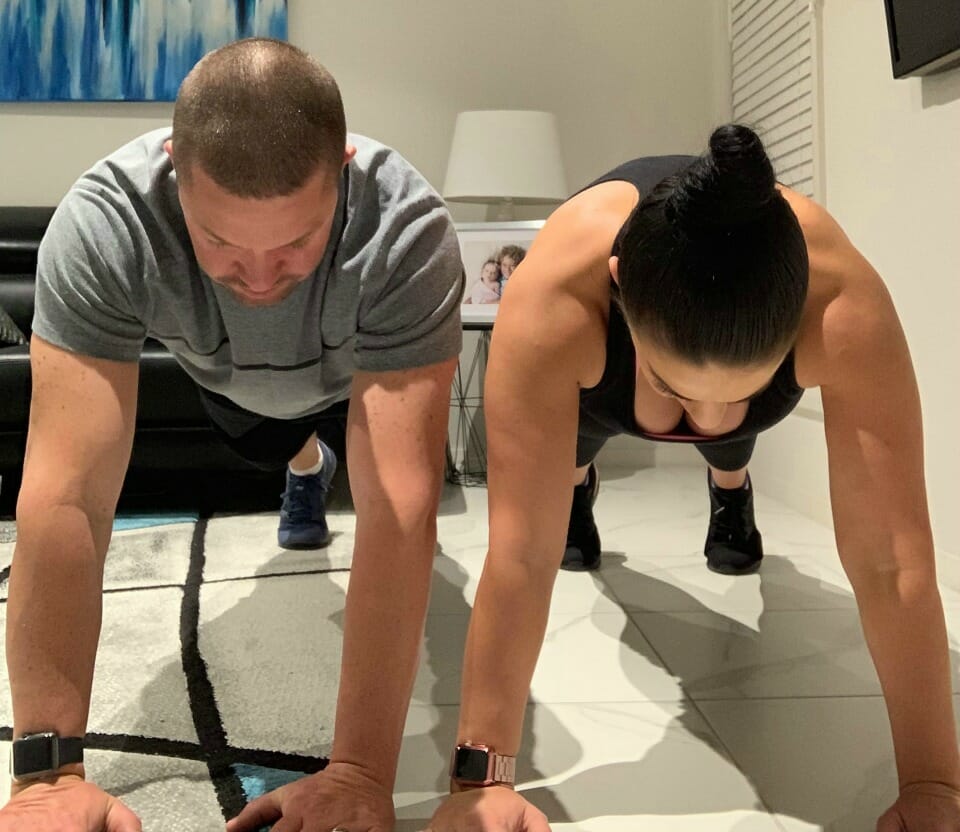 Jeff-and-Melissa-Timmer-doing-plank