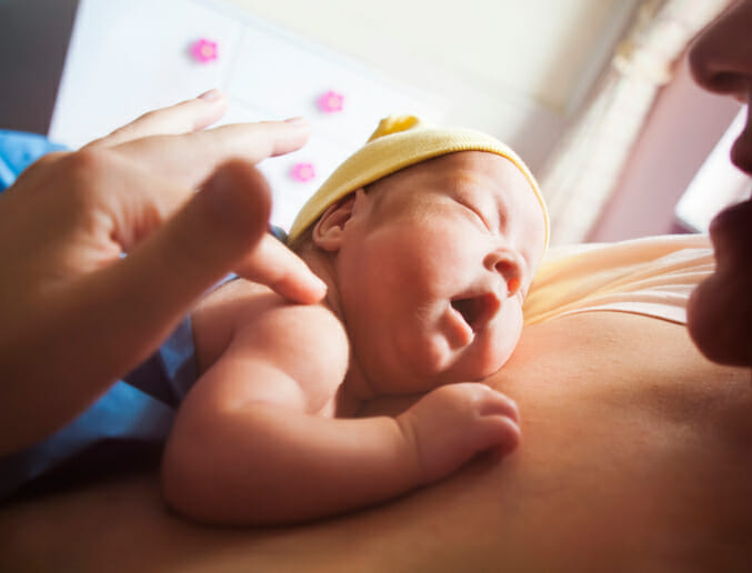 newborn baby with mum